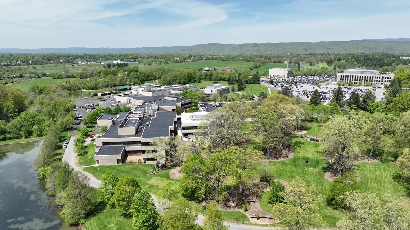 Aerial view of the Virginia-Maryland College of Veterinary Medicine on the Virginia Tech campus in Blacksburg, with the Blue Ridge behind it