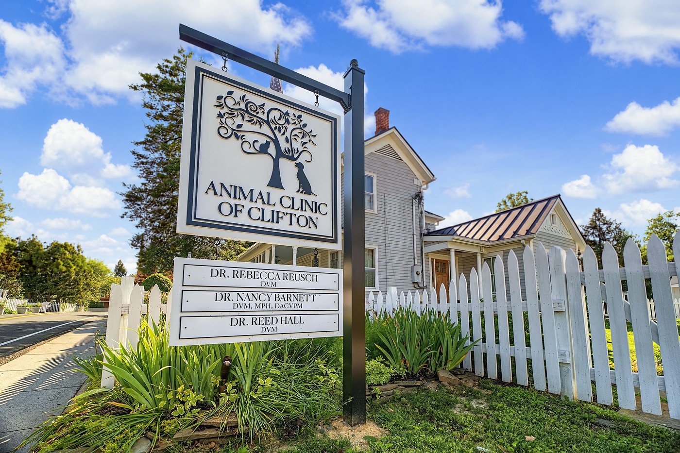 The Animal Clinic of Clifton sign on Chapel Road, listing Dr. Rebecca Reusch, Dr. Nancy Barnett and Dr. Reed Hall